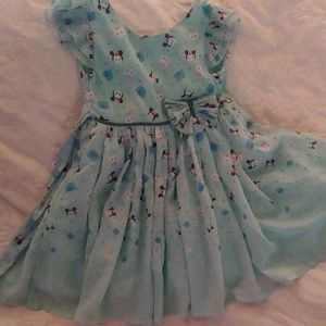 Very frilly lined light teal Disney dress